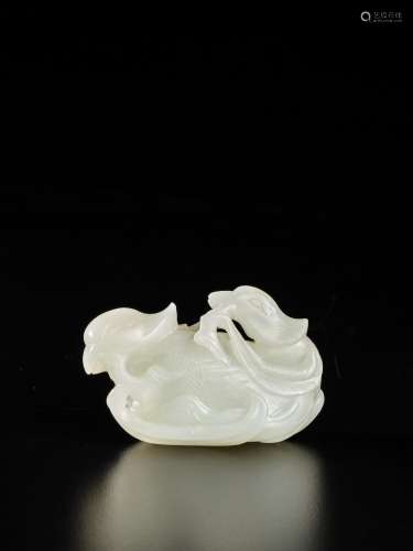 A white jade 'mandarin ducks and lotus' group, Qing dynasty,...