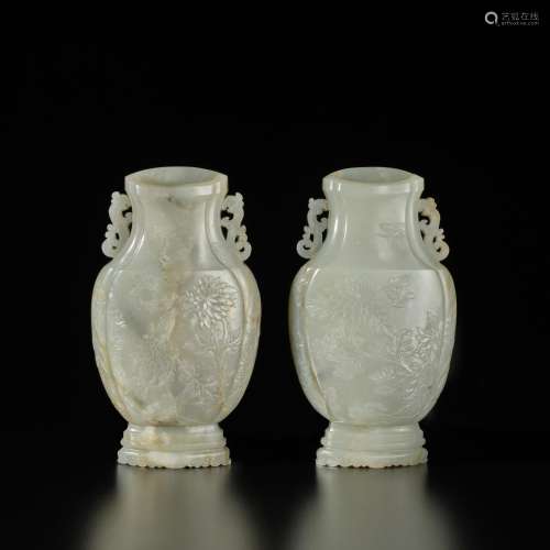 A pair of celadon jade lobed 'chrysanthemum' wall vases, Qin...