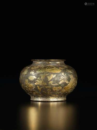 A small parcel-gilt silver 'mandarin ducks' jar, Tang dynast...