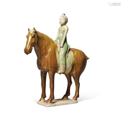 A sancai-glazed pottery figure of a female equestrian, Tang ...