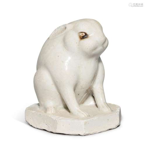 A white-glazed stoneware figure of a seated hare, Tang dynas...