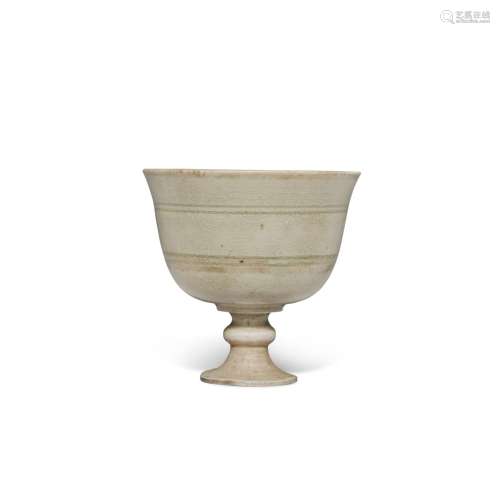 A celadon-glazed stem cup, Sui dynasty | 隋 青釉高足盃