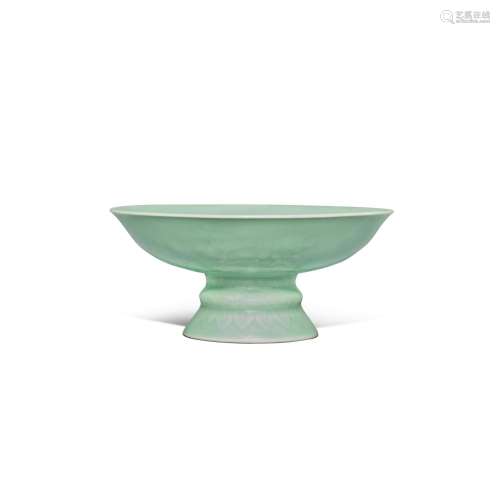 A carved celadon-glazed 'bird and flower' tazza, Seal mark a...