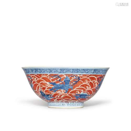 An iron-red and underglaze-blue 'mythical beasts' bowl, Mark...