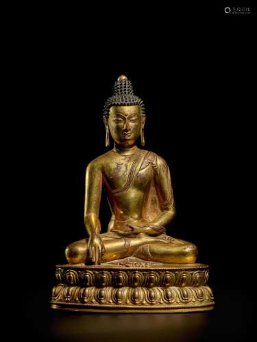 A GILT COPPER ALLOY FIGURE OF VAJRASANA BUDDHA TIBET, 14TH/1...