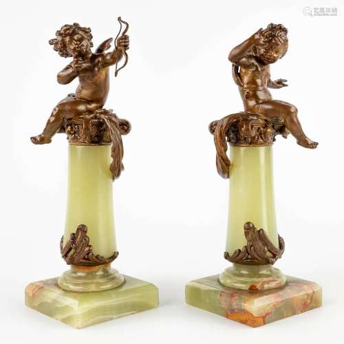 A pair of putti on a pedestal, spelter and onyx in Louis XV ...