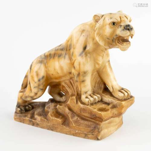 Figurine of a tiger, sculptured alabaster. 20th C. (D:13 x W...