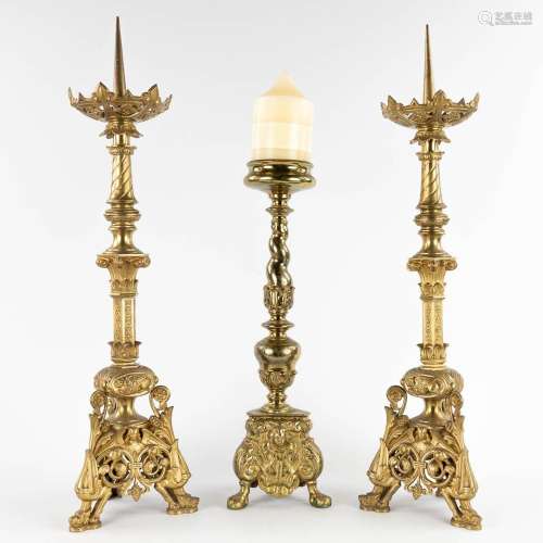A pair of antique bronze Chruch Candlesticks, and added a ca...