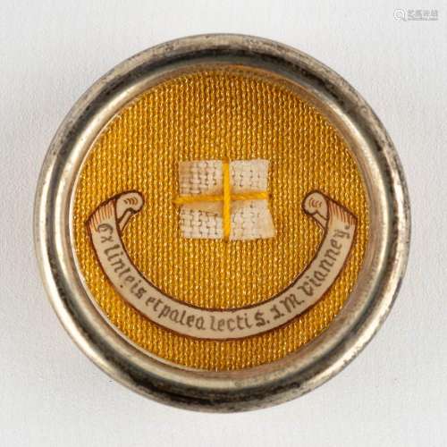 A sealed theca with relic: Ex Linteis Sancti Joannis Babtist...