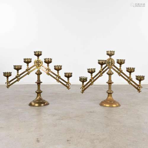 A pair of bronze candelabra with adjustable arms, and 7 cand...
