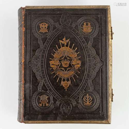 An antique 'Holy Bible' with thick and decorated leather cov...