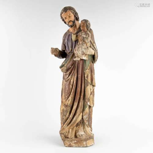 An antique wood-sculpture, Joseph with Child, original polyc...