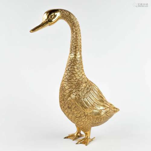 A large figurative goose, gold-plated metal. 20th C. (D:15 x...