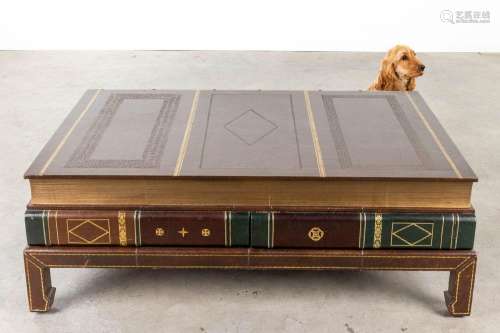 A coffee table in the shape of a large book, circa 1980. (D:...
