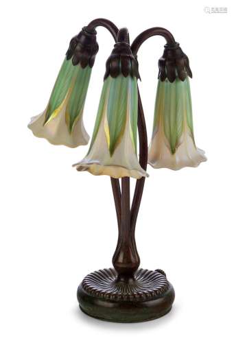 Tiffany Studios<br />
<br />
Three branch 'Lily' table lamp ...