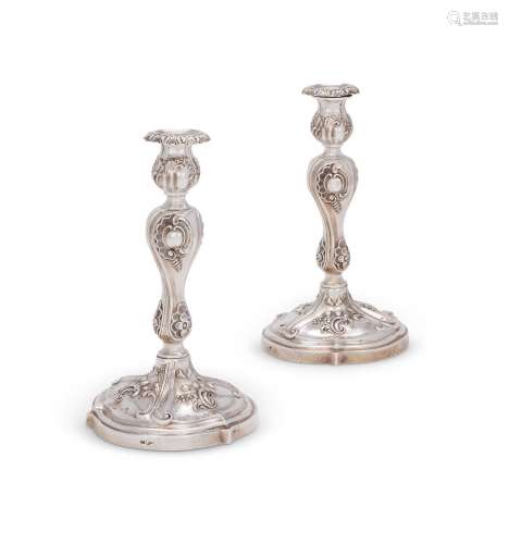 A PAIR OF RUSSIAN SILVER CANDLESTICKS