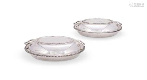 A PAIR OF SILVER OVAL TUREENS AND COVERS