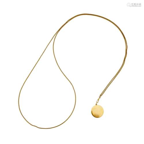 A GOLD COLOURED LOCKET ON LONG CHAIN