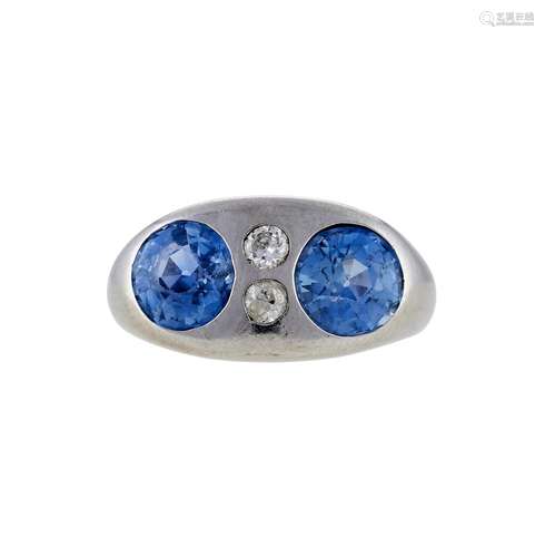 A SAPPHIRE AND DIAMOND FOUR STONE RING