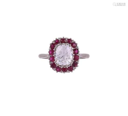 A DIAMOND AND RUBY CLUSTER RING