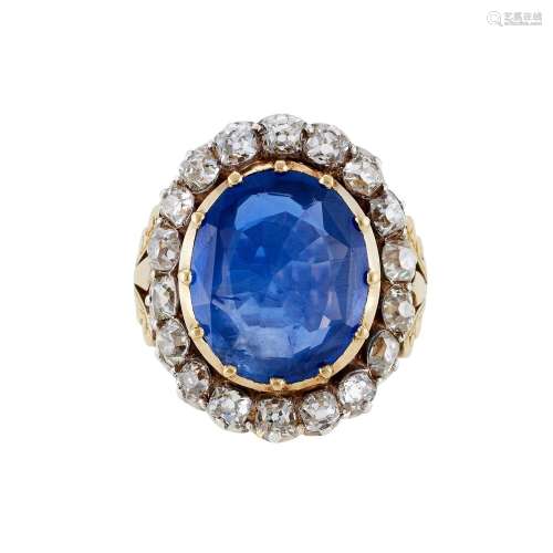 A SAPPHIRE AND DIAMOND CLUSTER RING