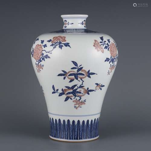 Plum vase with red melon and fruit flower patterns in blue a...