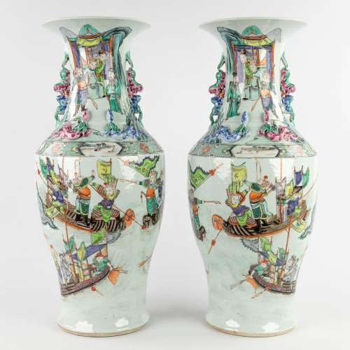 A pair of Chinese Famille Rose vases decorated with warriors...