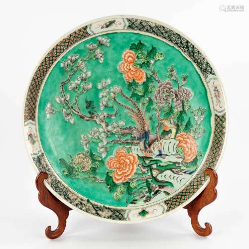 A Chinese Famille Verte plate, decorated with birds and flow...