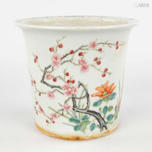 A Chinese cache-pot decorated with flowers and branches. Gua...