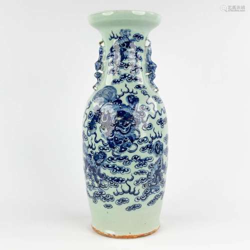 A Chinese celadon vase, blue-white, decorated with a Foo Dog...