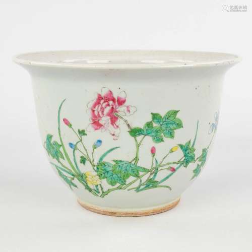 A Chinese Famille Rose cache pot, decorated with flowers. 19...