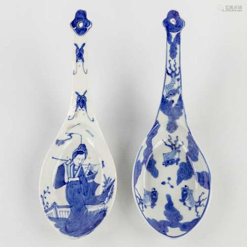 Two spoons, blue-white decor of a koi and lady. 18th/19th C....