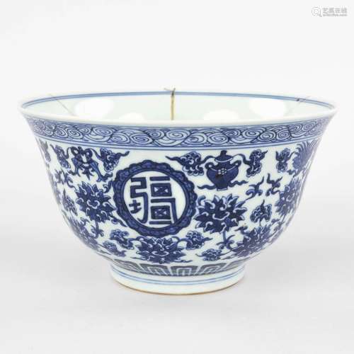 A Chinese bowl with blue-white decor, Jiaqing mark and perio...