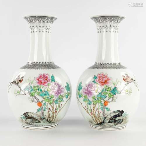 A pair of Chinese vases, decorated with fauna and flora, 20t...