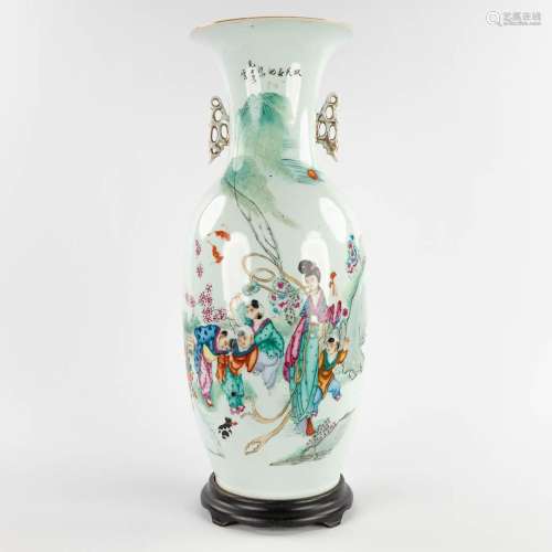 A Chinese vase decorated with a lady and children. 19th/20th...