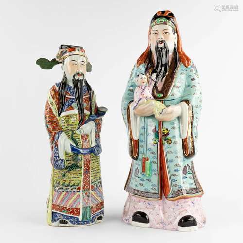 A Chinese figurine of a wise man, added another figurine. 20...