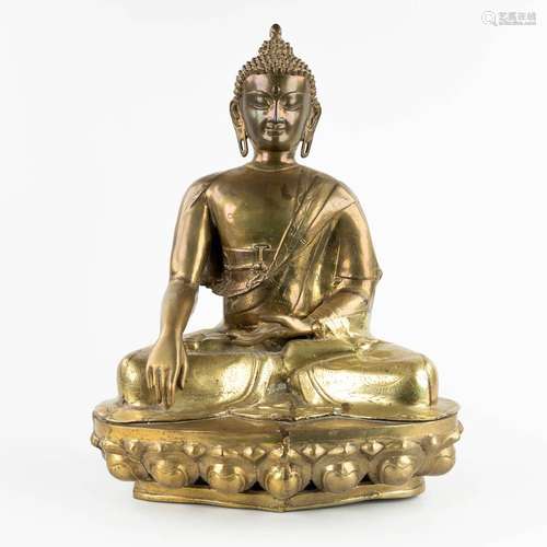 A decorative Thai buddha on a lotus flower, bronze, 20th C. ...