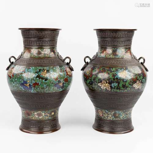 A pair of Oriental vases made of bronze with champslevé deco...