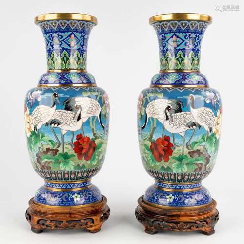 A pair of Chinese bronze cloisonné vases, decorated with cra...