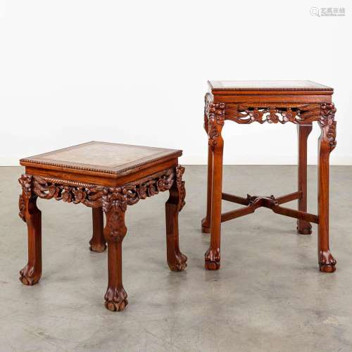 Two Oriental hardwood stands with a marble top. 20th C. (D:5...