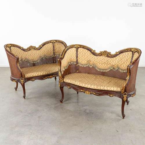 A pair of settee's, sculptured wood in Louis XV style and fi...