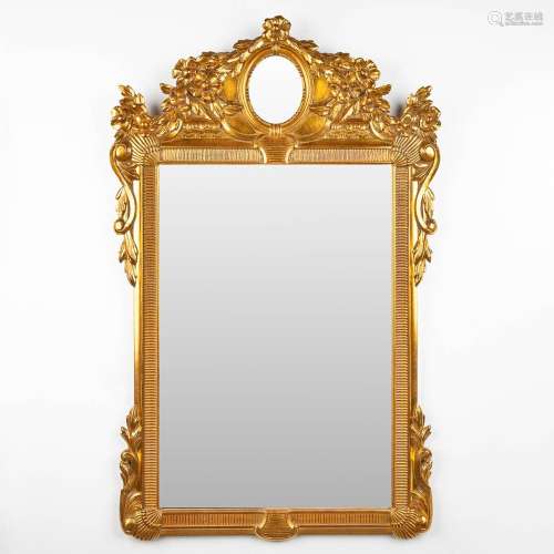 Deknudt, a gold-plated mirror. 20th C. (W:76 x H:124 cm)