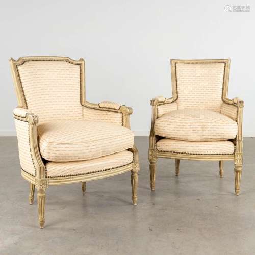 A pair of armchairs, sculptured wood with fabric in Louis XV...