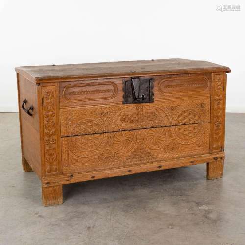An antique chest with wood-sculptured panels. 19th C. (D:66 ...