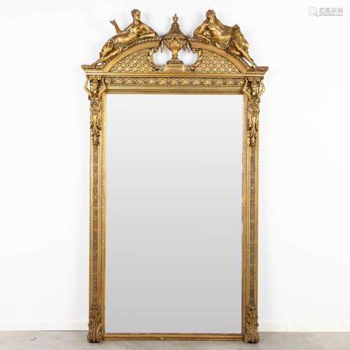A large mirror, gilt and decorated with Kariatyds, circa 190...
