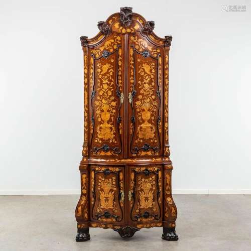 An antique corner cabinet with marquetry in Louis XV style. ...