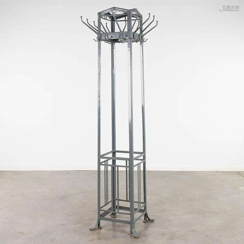 A metal coathanger in the style of Gustave SERRURIER BOVY (1...