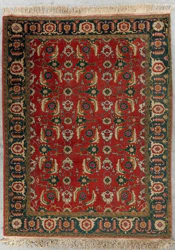 An Oriental hand-made carpet, Persian. (D:173 x W:128 cm)