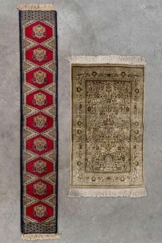Two Oriental carpets. Silk and Wool. (D:103 x W:63 cm)