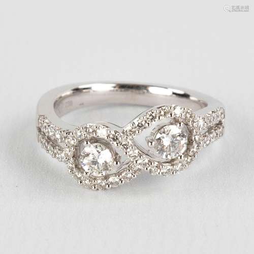 A ring, 18kt white gold, brilliant cut diamonds, approximate...